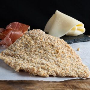 Cachopo de vedella amb formatge i pernil salat